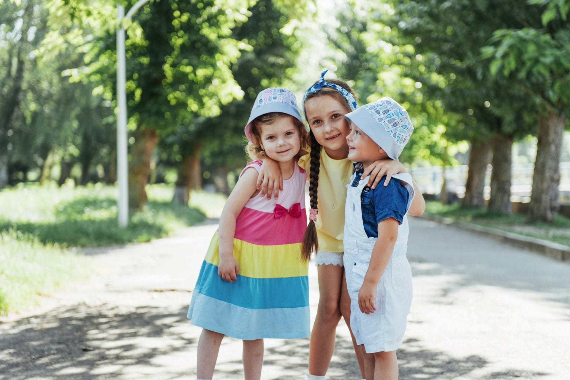 Lovely cute kids playing in the park a beautiful summer